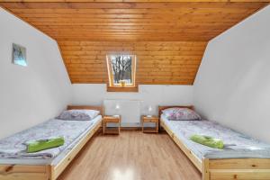Postel nebo postele na pokoji v ubytování Ubytování nad Bisonem