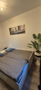 A bed or beds in a room at Apartment Hibiscus