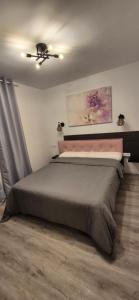 A bed or beds in a room at Apartment Hibiscus