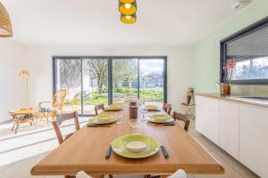 Φωτογραφία από το άλμπουμ του Maison moderne et spacieuse avec jardin à Pessac σε Pessac