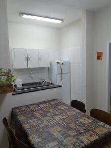 Η κουζίνα ή μικρή κουζίνα στο Apartamento Gonzaga