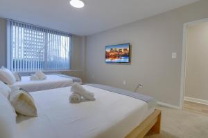 Llit o llits en una habitació de Prime Location! 2BR Apartment in Crystal City