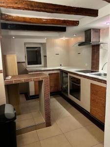 a kitchen with a sink and a counter in it at Großes Haus in Jülich Neu möbiliert in Jülich