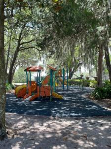 a playground in a park with a bunch of slides at 208 Gunter in Saint Marys