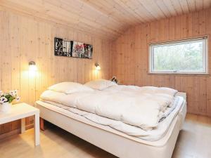 Ένα ή περισσότερα κρεβάτια σε δωμάτιο στο 4 star holiday home in Idestrup