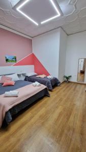 Posteľ alebo postele v izbe v ubytovaní B&B ONE