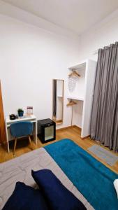 Posteľ alebo postele v izbe v ubytovaní B&B ONE