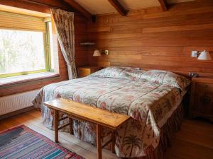 Ένα ή περισσότερα κρεβάτια σε δωμάτιο στο Casa Cóndor
