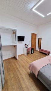 Posteľ alebo postele v izbe v ubytovaní B&B ONE