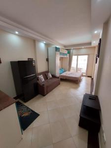 Postel nebo postele na pokoji v ubytování Cecilia resort منتجع سيسيليا