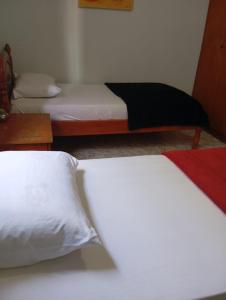 Triana Guest House客房内的一张或多张床位