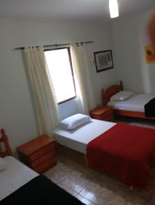 Triana Guest House客房内的一张或多张床位