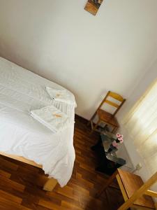 Llit o llits en una habitació de ENEDE HOSTEL