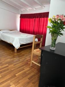 Llit o llits en una habitació de ENEDE HOSTEL