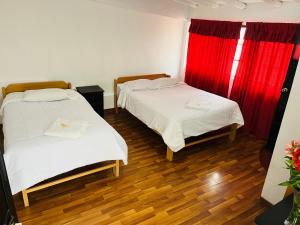 Llit o llits en una habitació de ENEDE HOSTEL