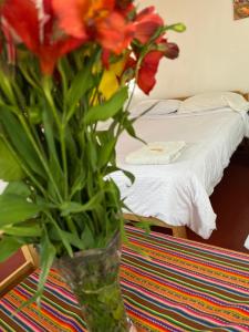 Llit o llits en una habitació de ENEDE HOSTEL