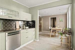 Kuchyň nebo kuchyňský kout v ubytování Leilighet i Sandviken