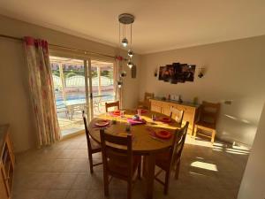 a kitchen and dining room with a table and chairs at Villa Sharm El-Sheikh in Sharm El Sheikh
