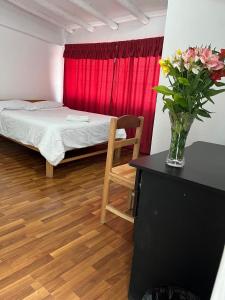 Llit o llits en una habitació de ENEDE HOSTEL