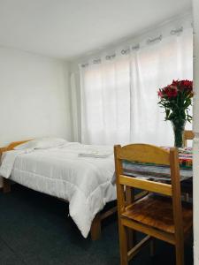Llit o llits en una habitació de ENEDE HOSTEL