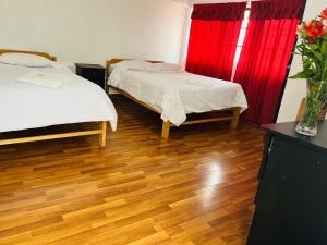 Llit o llits en una habitació de ENEDE HOSTEL
