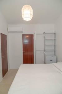 Postel nebo postele na pokoji v ubytování Casa cochera