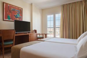 Postel nebo postele na pokoji v ubytování Hotel Diamar + 37 fotografií