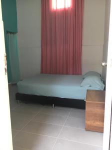 Hotel Pelman客房内的一张或多张床位
