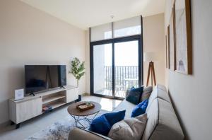 TV a/nebo společenská místnost v ubytování Estilo Minimalista frente Arena y Parque Fundidora