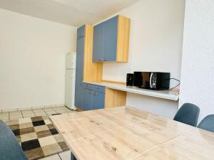 Kuchyň nebo kuchyňský kout v ubytování Calevas BnB2 + 36 fotografií