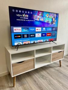 TV a/nebo společenská místnost v ubytování Calevas BnB2