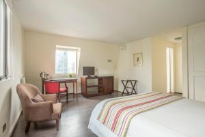 Postel nebo postele na pokoji v ubytování MR Express (ex Hotel Neruda Express)