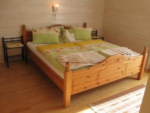 Кровать или кровати в номере Appartements Schusser