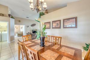 a dining room with a table and chairs at Safari Lodge in Orlando