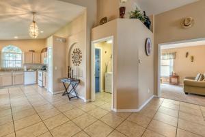 a large kitchen and living room with a couch at Safari Lodge in Orlando