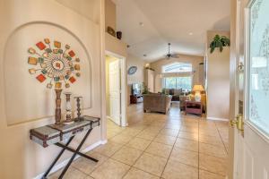 a living room with a tile floor at Safari Lodge in Orlando