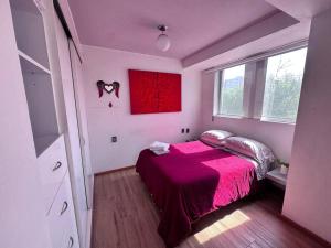 Una cama o camas en una habitación de Absolute BEST location in CDMX