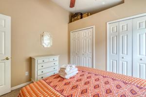 a bedroom with a bed and a white door at Safari Lodge in Orlando