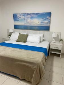 Postel nebo postele na pokoji v ubytování Blue coral beachfront studio