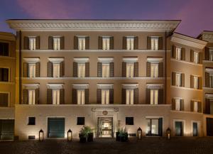 a rendering of the front of a building at night at Palazzo Scanderbeg in Rome