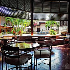 Hotel Marina Copan tesisinde bir restoran veya yemek mekanı