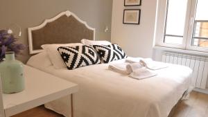 Krevet ili kreveti u jedinici u objektu B&B Casa Angelini