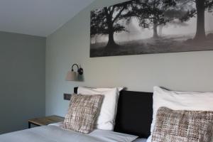 Postel nebo postele na pokoji v ubytování B&B de Rijcke Rust