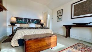 Letto o letti in una camera di The Whitfield