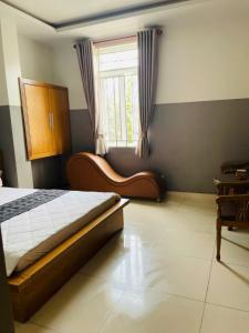 Ένα ή περισσότερα κρεβάτια σε δωμάτιο στο 10h Hotel