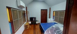 TV a/nebo společenská místnost v ubytování Starry Night Cottage Resort, Doi lor, Chiangmai + 13 fotografií