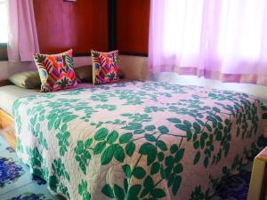 Postel nebo postele na pokoji v ubytování Small Guest House Koh Kood