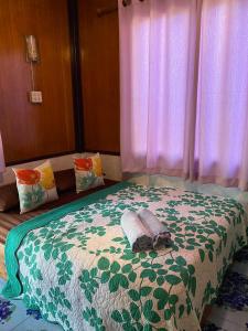 Postel nebo postele na pokoji v ubytování Small Guest House Koh Kood