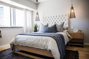 Postel nebo postele na pokoji v ubytování Seabreeze Apartment + 12 fotografií