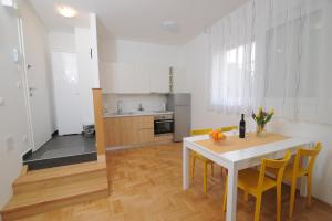 Kuchyňa alebo kuchynka v ubytovaní Amaros Apartment